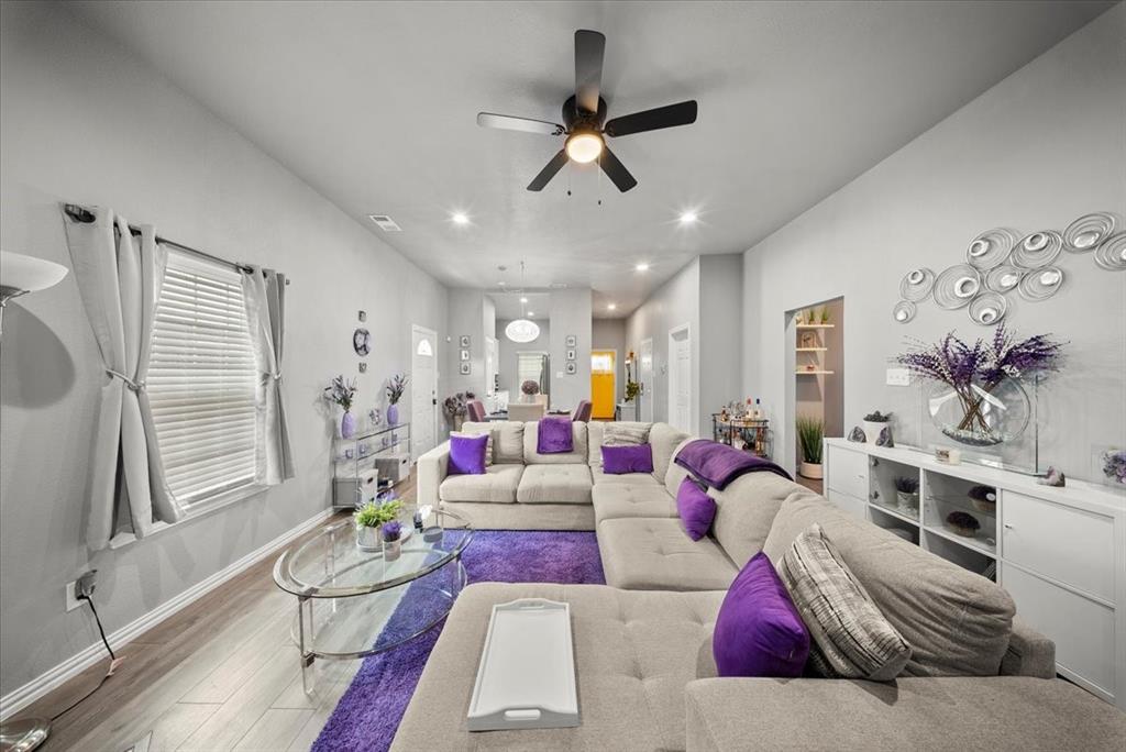 5312 Black Hawk Street Dallas, TX 75212 - Photo 8 of 24 a living room with furniture and view of kitchen