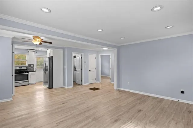 a view of a livingroom with wooden floor