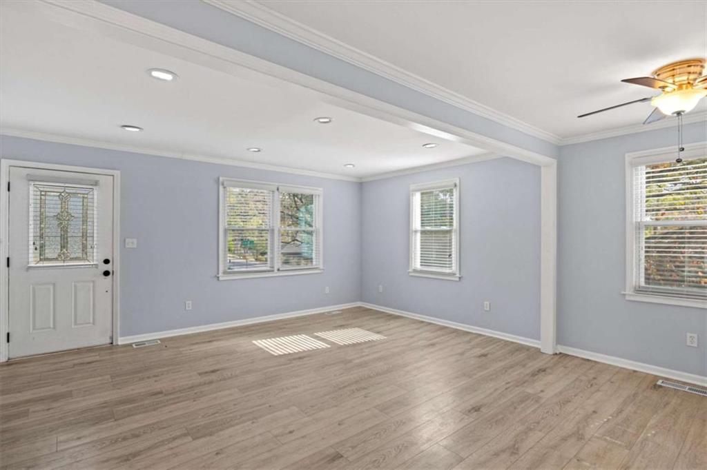 701 Daniel Avenue Decatur, GA 30032 - Photo 23 of 37 a view of an empty room with wooden floor and a window