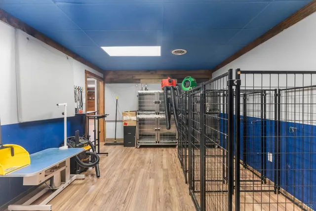 a view of an entryway with wooden floor