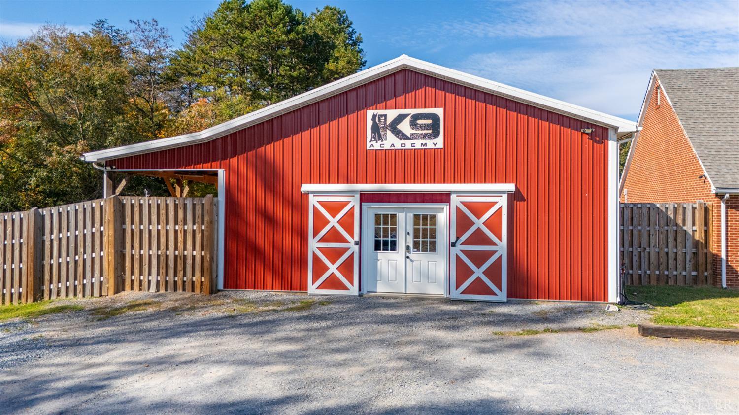 273 Riverbend Road Altavista, VA 24517 - Photo 25 of 57 a blue sign that is sitting in front of a house