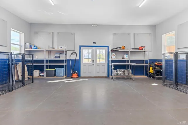 a view of kitchen with furniture and a ceiling fan