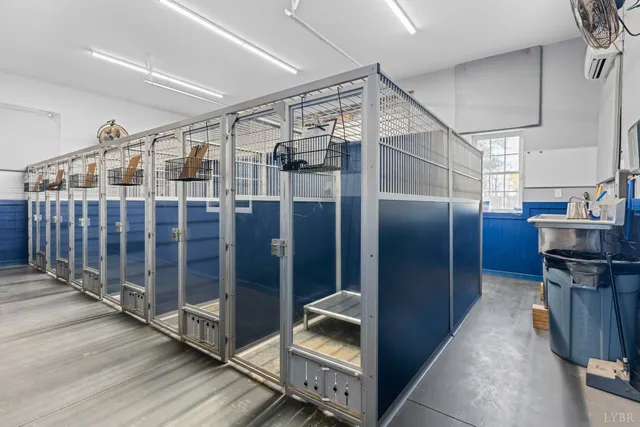 a close view of light fixtures and kitchen countertops with wooden floor