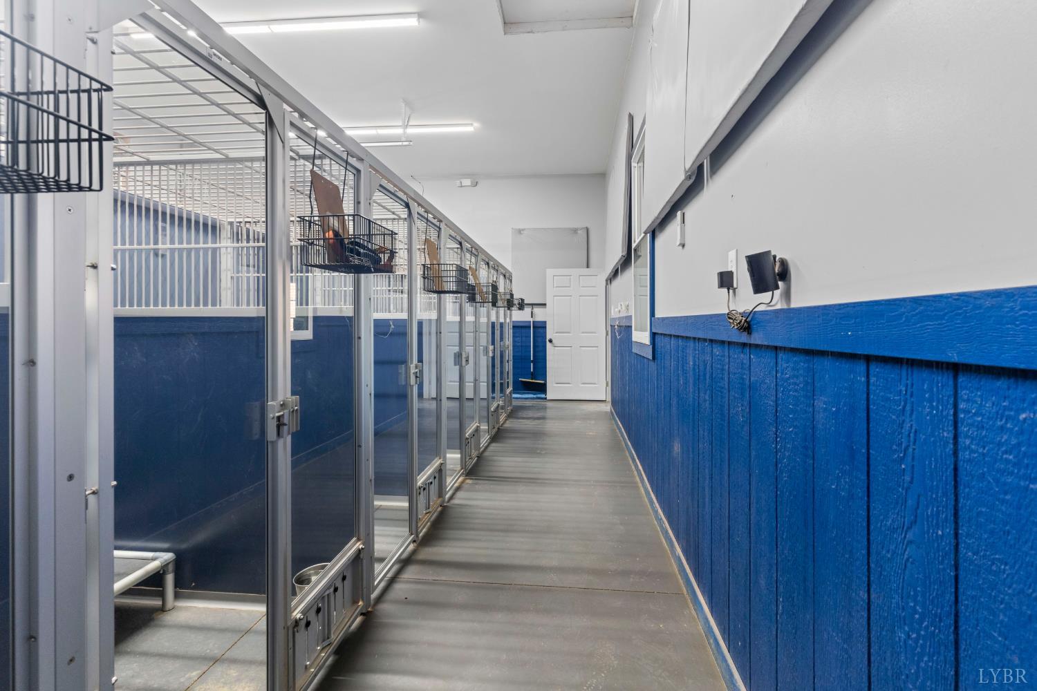 273 Riverbend Road Altavista, VA 24517 - Photo 35 of 57 a hallway with wooden floor and staircase