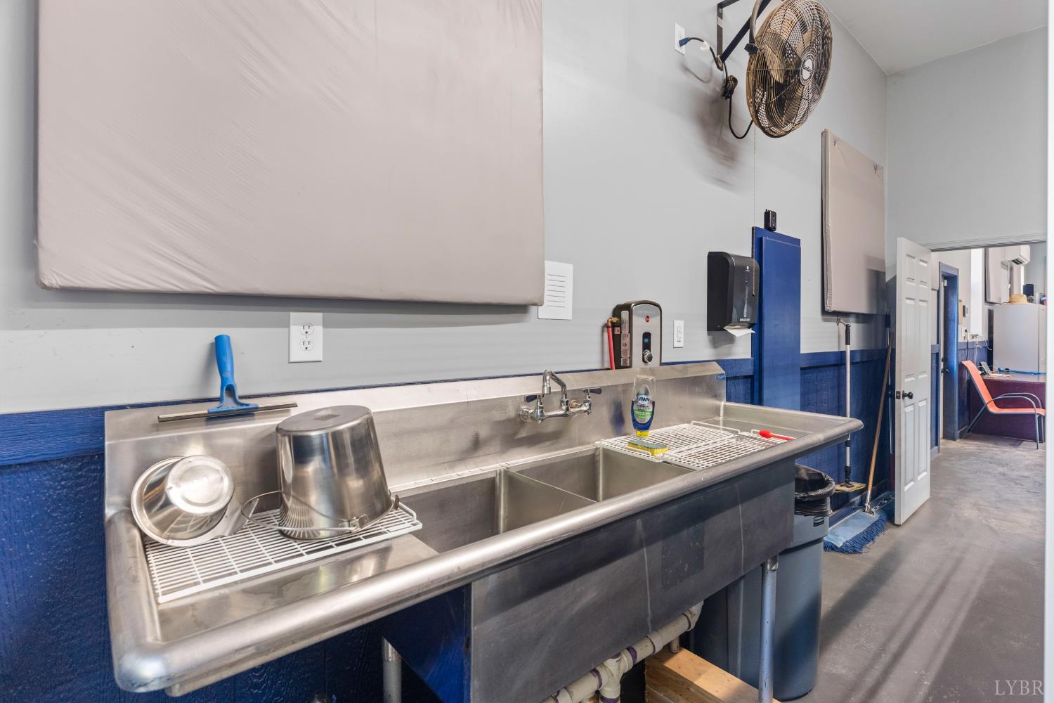 273 Riverbend Road Altavista, VA 24517 - Photo 37 of 57 a close view of light fixtures and kitchen countertops with wooden floor