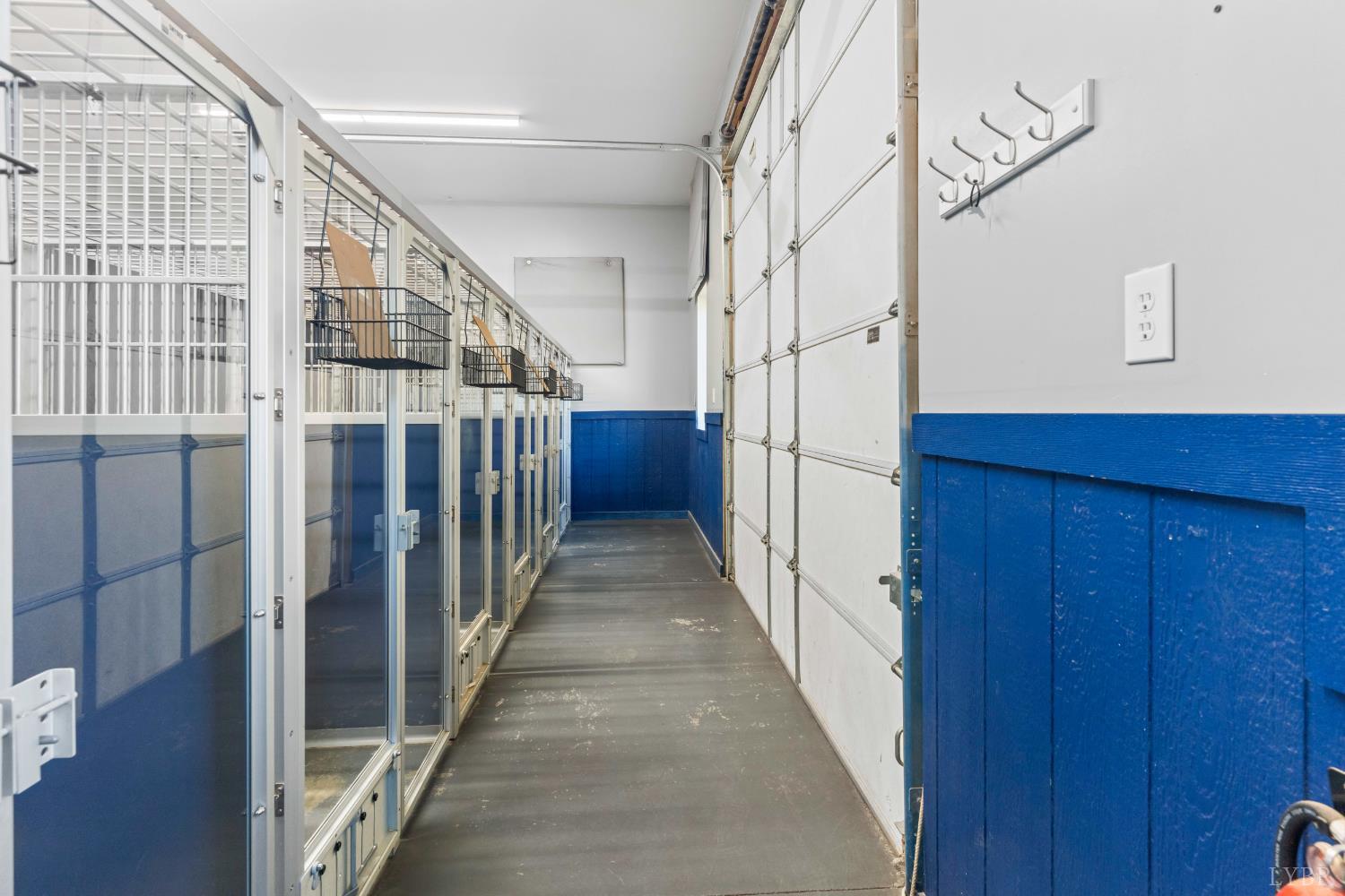 273 Riverbend Road Altavista, VA 24517 - Photo 39 of 57 a view of staircase with lots of frames on wall and wooden floor