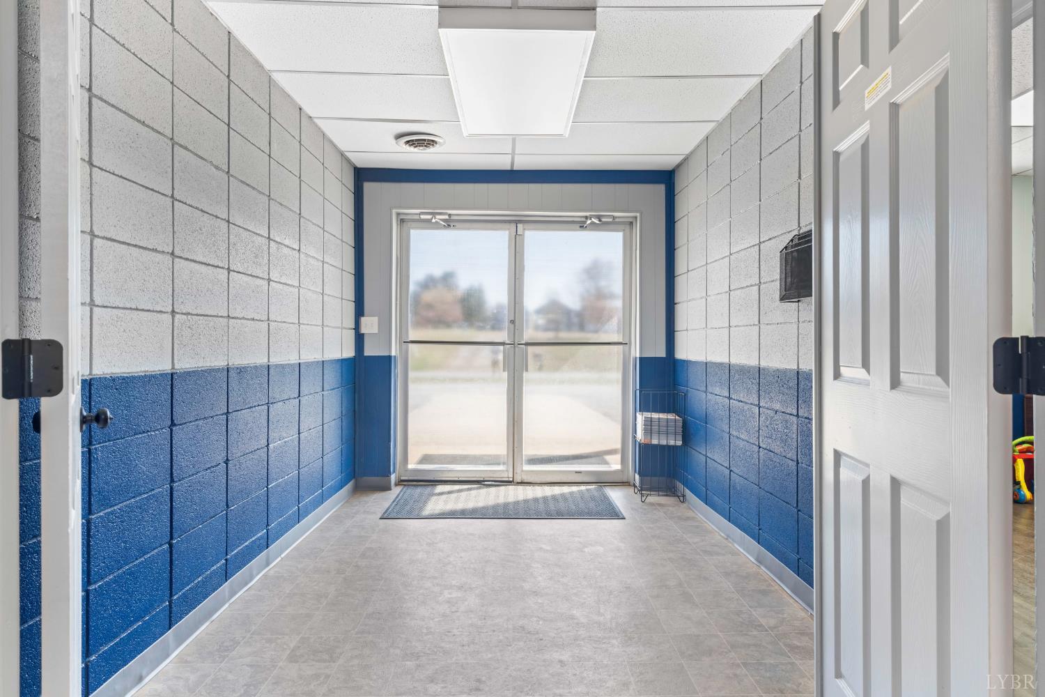 273 Riverbend Road Altavista, VA 24517 - Photo 5 of 57 a view of a room with a large window and wooden floor