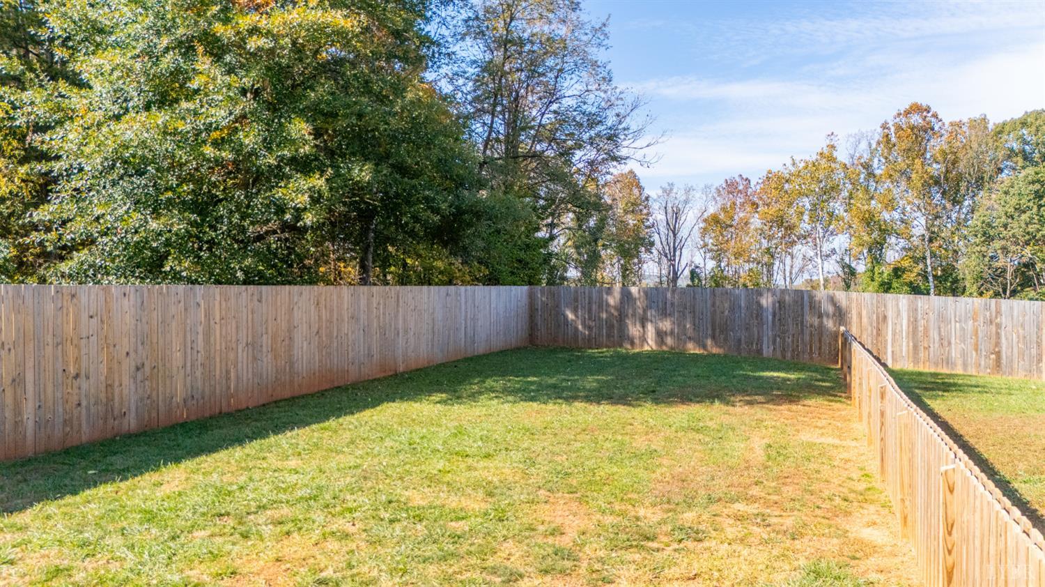 273 Riverbend Road Altavista, VA 24517 - Photo 51 of 57 a view of a backyard with wooden fence