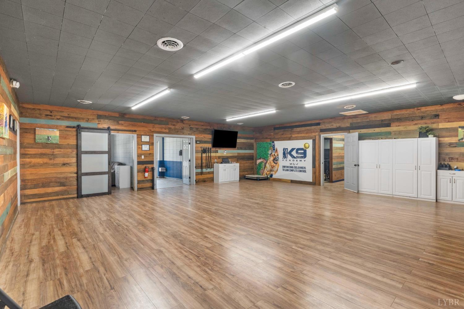 273 Riverbend Road Altavista, VA 24517 - Photo 10 of 57 a view of an empty room with furniture and wooden floor