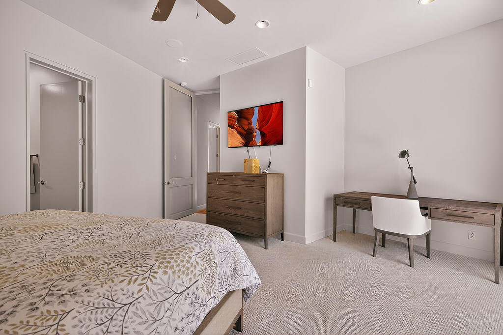 9 Rockcrest Drive Rancho Mirage, CA 92270 - Photo 36 of 64 a bedroom with a bed and a flat screen tv