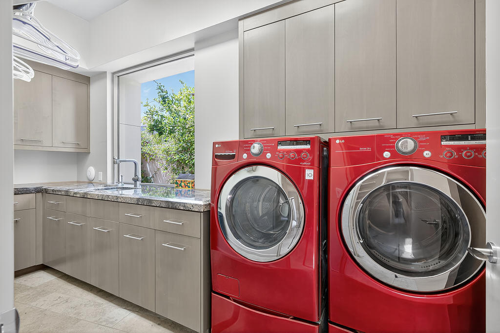 9 Rockcrest Drive Rancho Mirage, CA 92270 - Photo 47 of 64 a utility room with dryer and washer