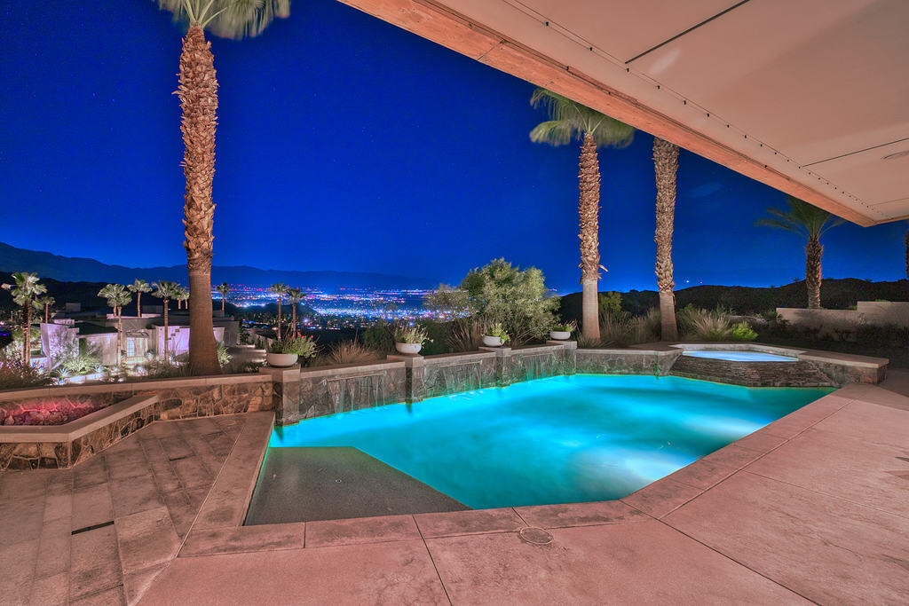 9 Rockcrest Drive Rancho Mirage, CA 92270 - Photo 57 of 64 a view of a swimming pool with an outdoor seating