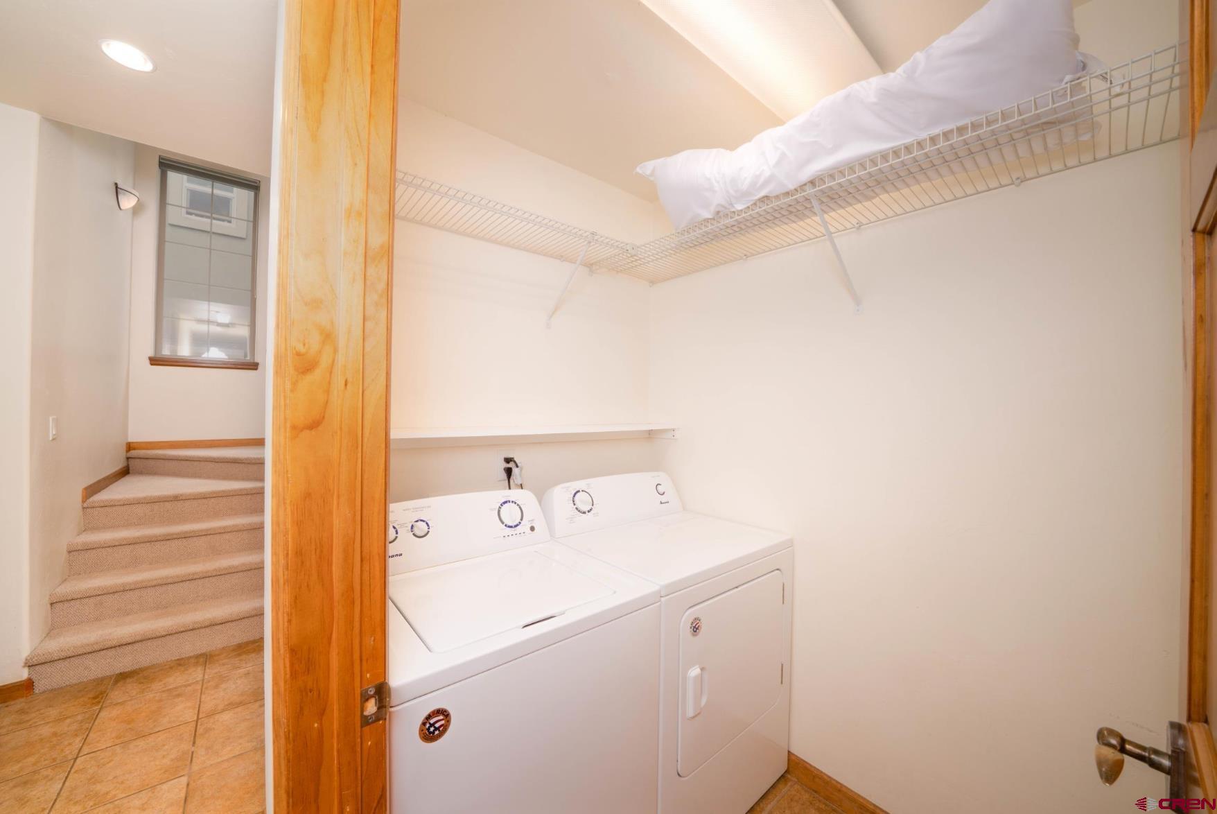 416 Amy Way Ridgway, CO 81432 - Photo 16 of 26 a utility room with dryer and washer