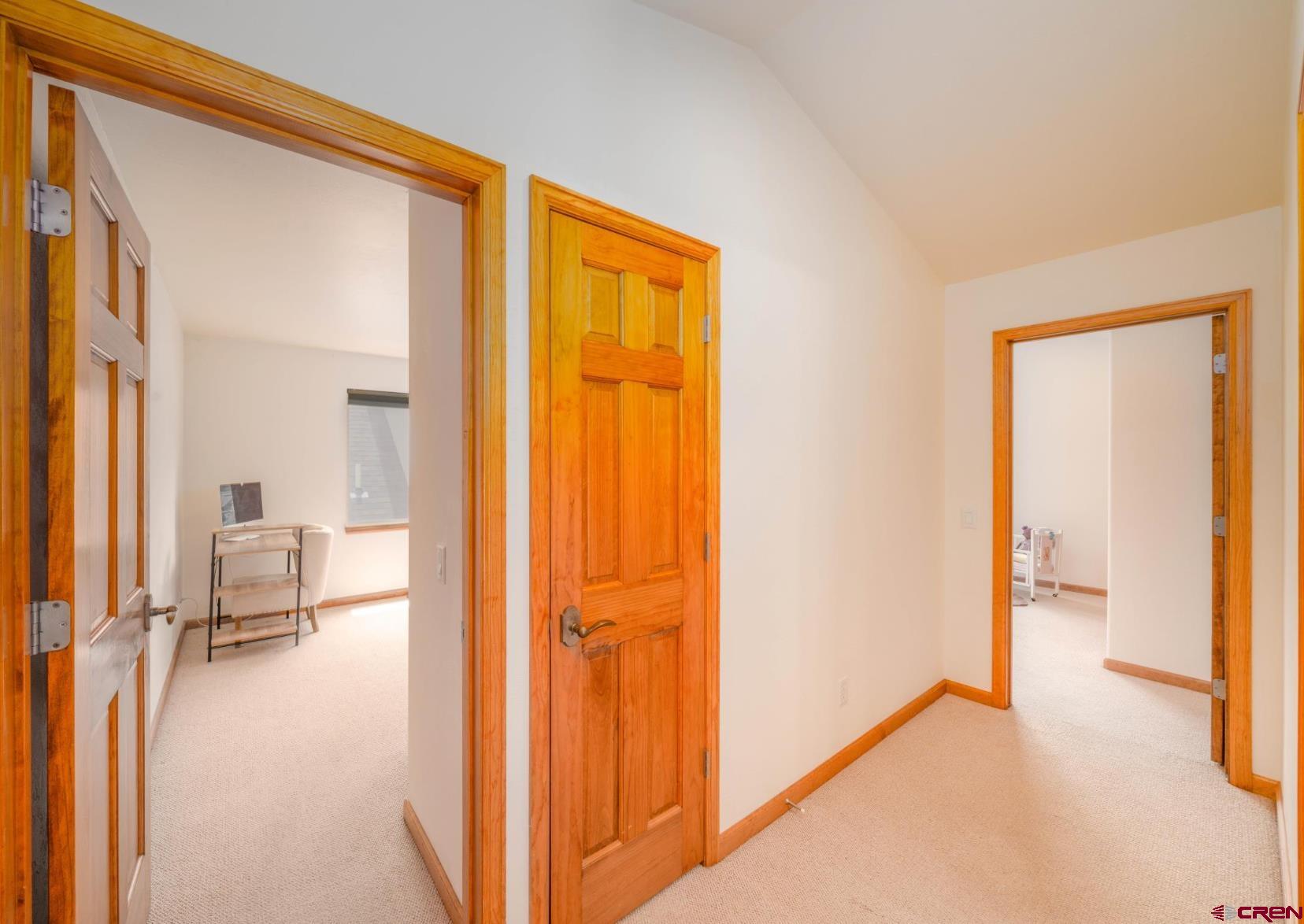 416 Amy Way Ridgway, CO 81432 - Photo 19 of 26 a view of a hallway with bathroom and a bathroom