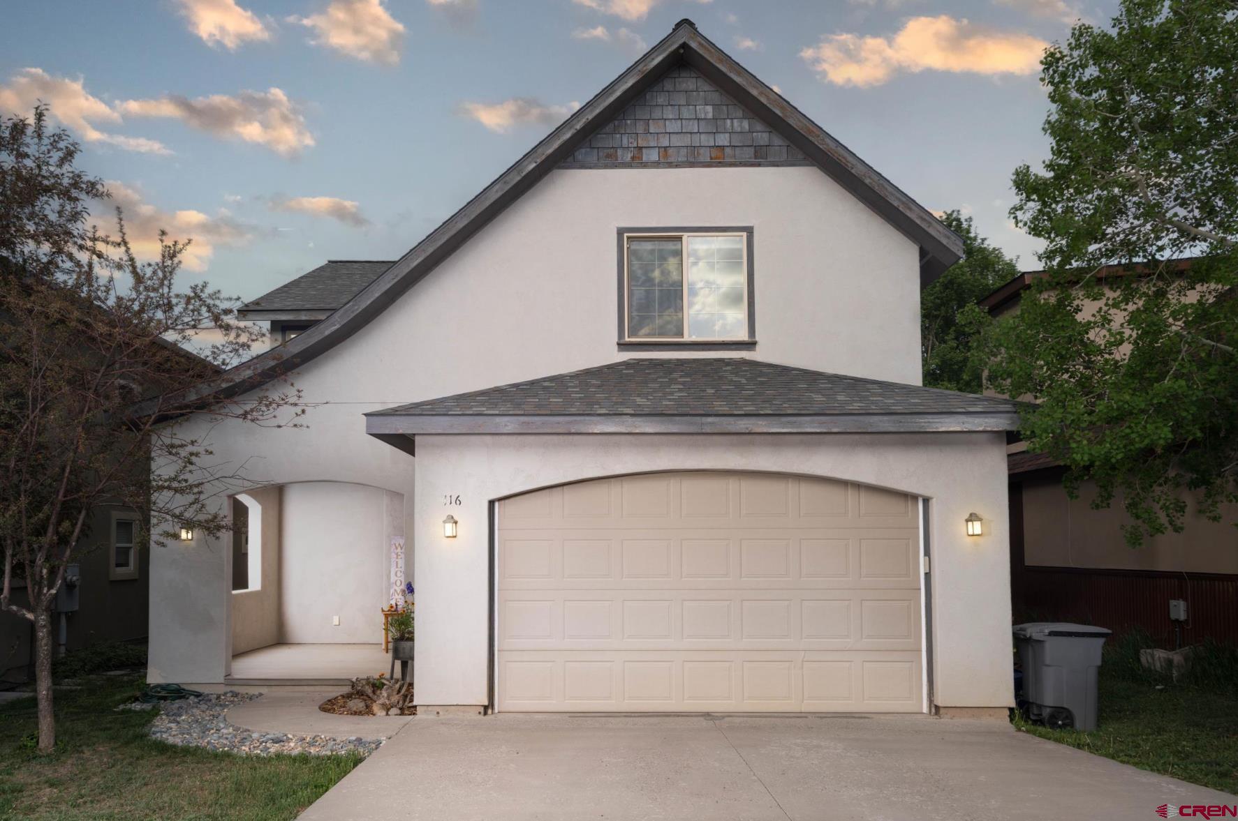 416 Amy Way Ridgway, CO 81432 - Photo 3 of 26 a front view of a house with a garage