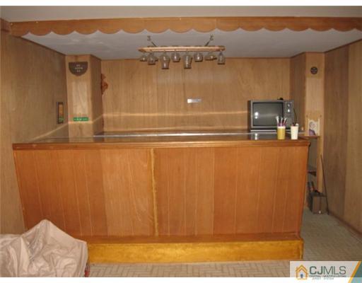 210 Bar Harbor Road Freehold, NJ 07728 - Photo 5 of 9 a view of a house with a window