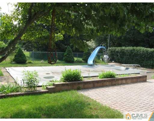 210 Bar Harbor Road Freehold, NJ 07728 - Photo 8 of 9 a view of a park with large trees