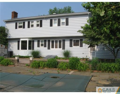 210 Bar Harbor Road Freehold, NJ 07728 - Photo 9 of 9 a front view of a house with a yard