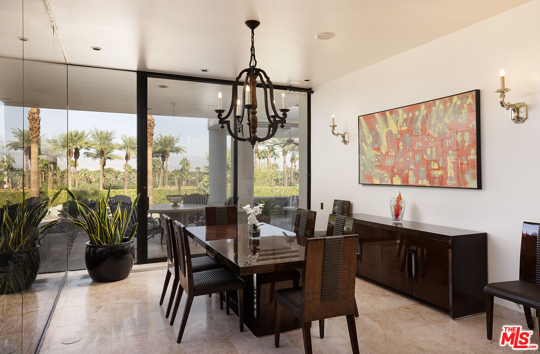 70418 Placerville Road Rancho Mirage, CA 92270 - Photo 13 of 28 a view of a dining room with furniture window and outside view