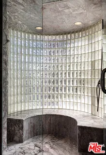 a kitchen view with a large window