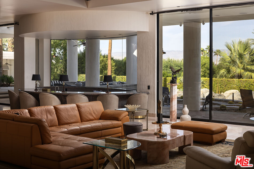 70418 Placerville Road Rancho Mirage, CA 92270 - Photo 7 of 28 a living room with furniture and a large window