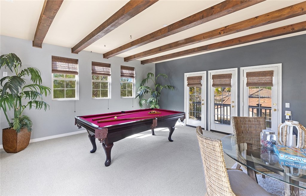 10464 Caribou Way Tustin, CA 92782 - Photo 21 of 34 a room with pool table and windows