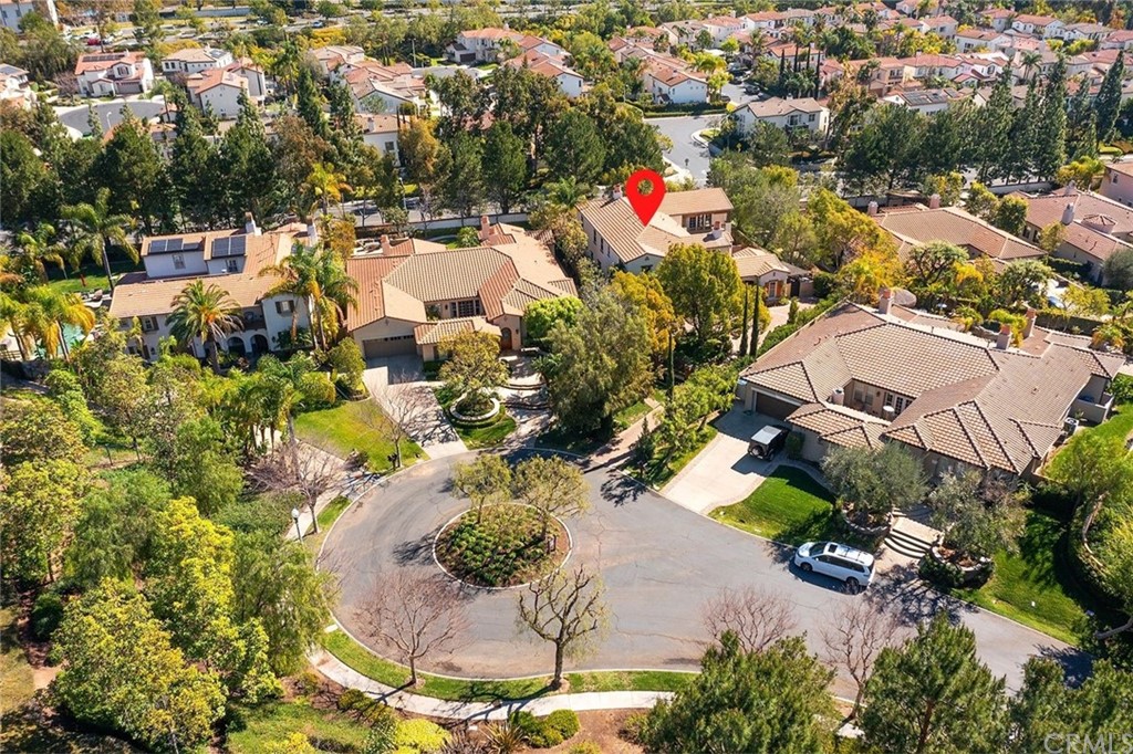 10464 Caribou Way Tustin, CA 92782 - Photo 28 of 34 an aerial view of residential houses with outdoor space