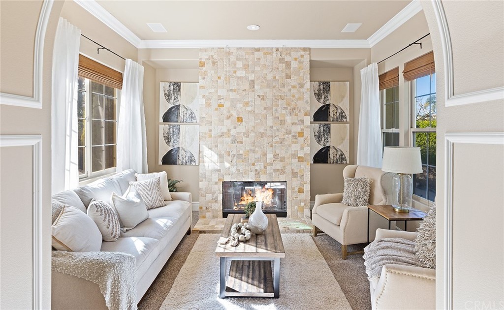 10464 Caribou Way Tustin, CA 92782 - Photo 5 of 34 a living room with furniture and a large window