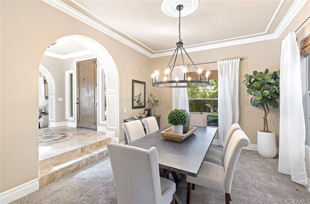 10464 Caribou Way Tustin, CA 92782 - Photo 6 of 34 a view of a dining room with furniture window and outside view