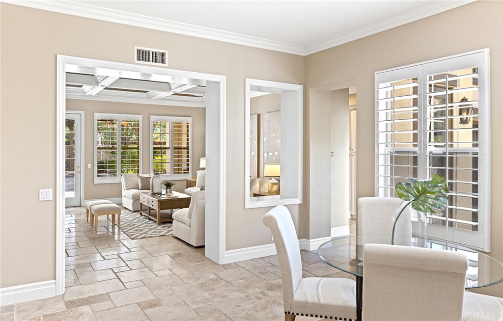 10464 Caribou Way Tustin, CA 92782 - Photo 9 of 34 a living room with furniture and a large window