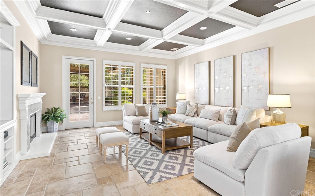 10464 Caribou Way Tustin, CA 92782 - Photo 10 of 34 a living room with furniture and a large window