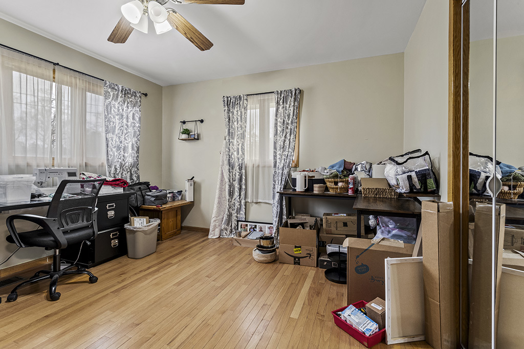 12401 68th Court Palos Heights, IL 60463 - Photo 14 of 24 a view of a workspace with furniture and a window