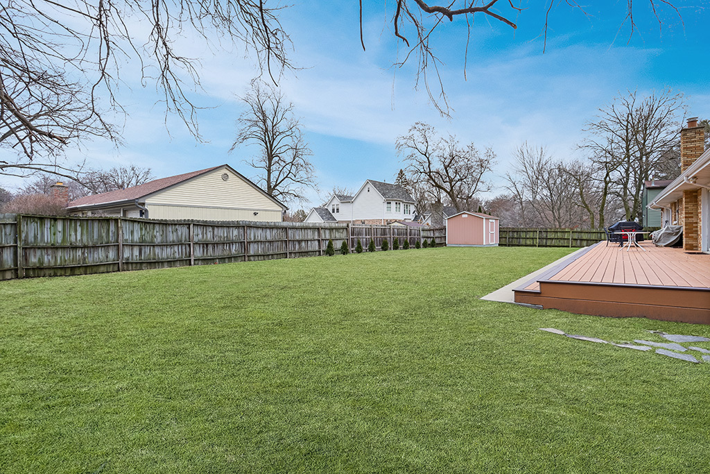 12401 68th Court Palos Heights, IL 60463 - Photo 22 of 24 a view of a house with a yard