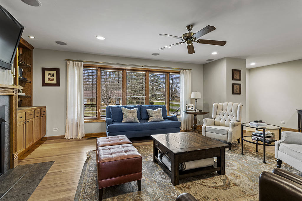 12401 68th Court Palos Heights, IL 60463 - Photo 4 of 24 a living room with furniture and a large window