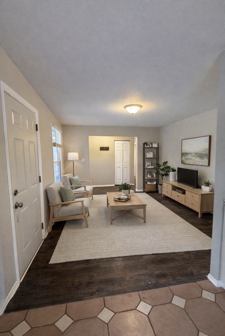 2490 Ridge Avenue Aurora, IL 60504 - Photo 4 of 25 a living room with furniture and a couch