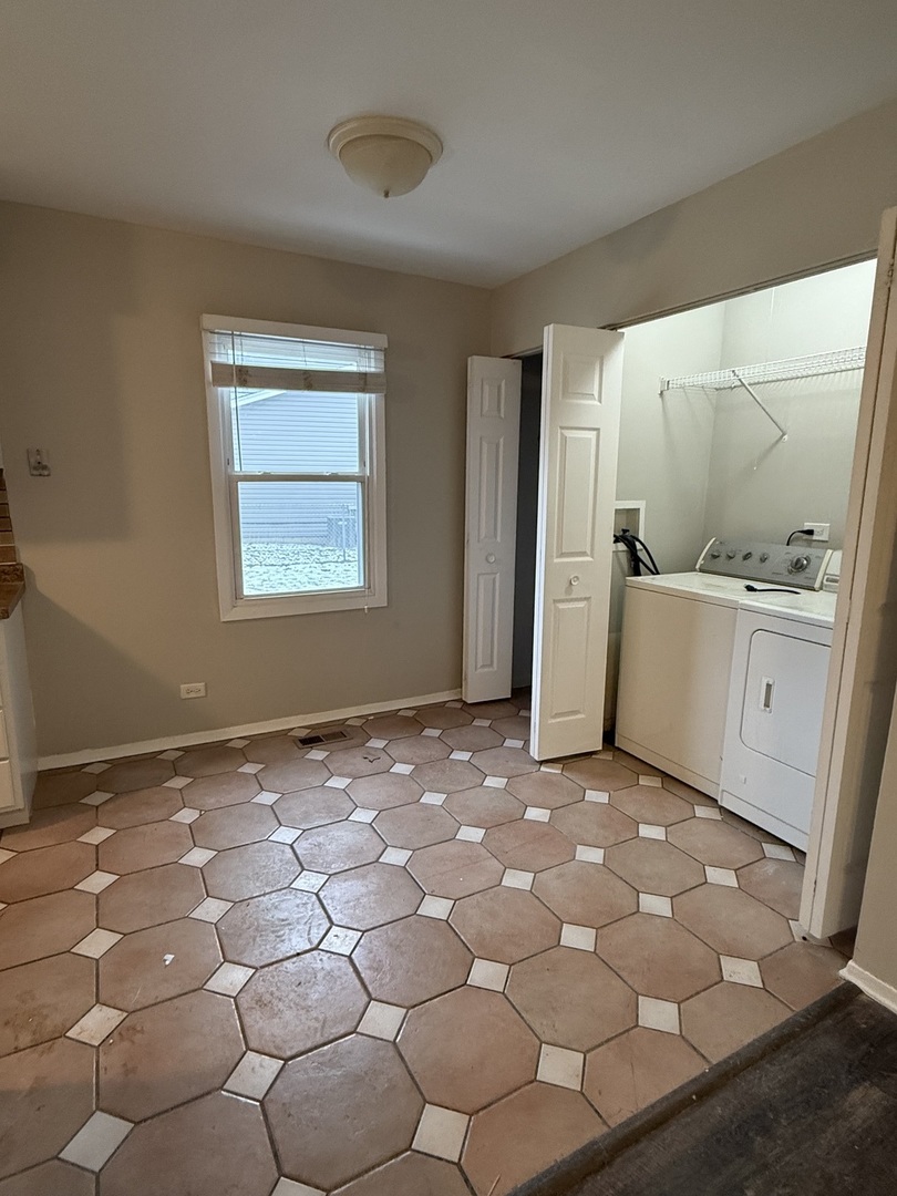 2490 Ridge Avenue Aurora, IL 60504 - Photo 8 of 25 a view of a livingroom with wooden floor and cabinet