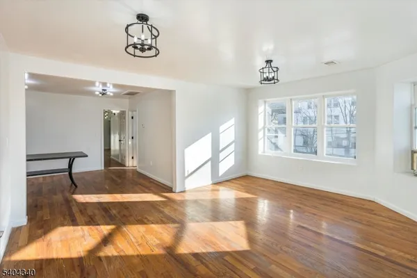 a view of livingroom with hardwood floor and window