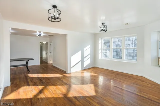 a view of livingroom with hardwood floor and window