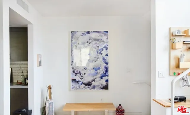 a picture of a wall with a painting on the wall