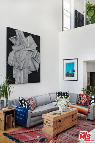 a living room with furniture and a couch