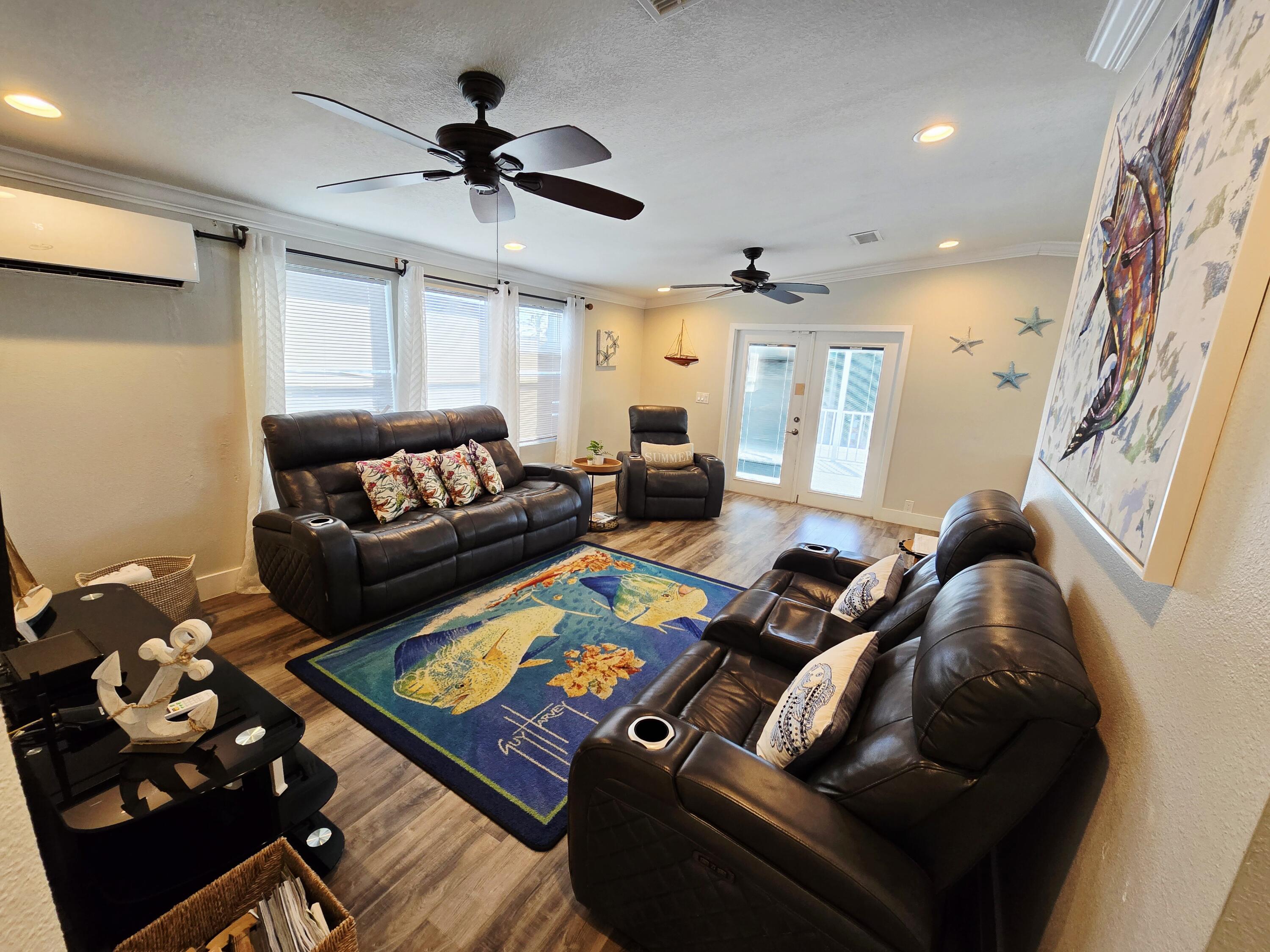 837 91st St Ocean Marathon, FL 33050 - Photo 12 of 27 a living room with furniture and wooden floor
