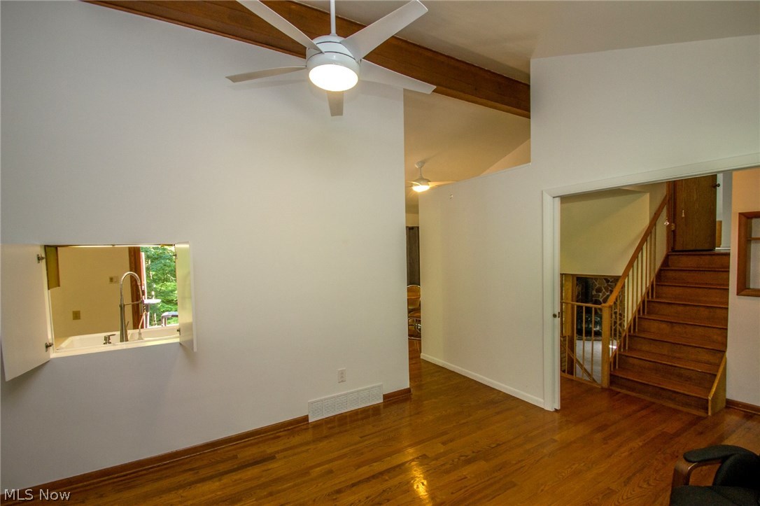 8107 Stone Road Independence, OH 44131 - Photo 4 of 29 Living room with vaulted ceiling