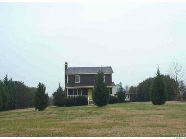 13435 Cleveland Road Garner, NC 27529 - Photo 1 of 1 a view of a big house with a big yard