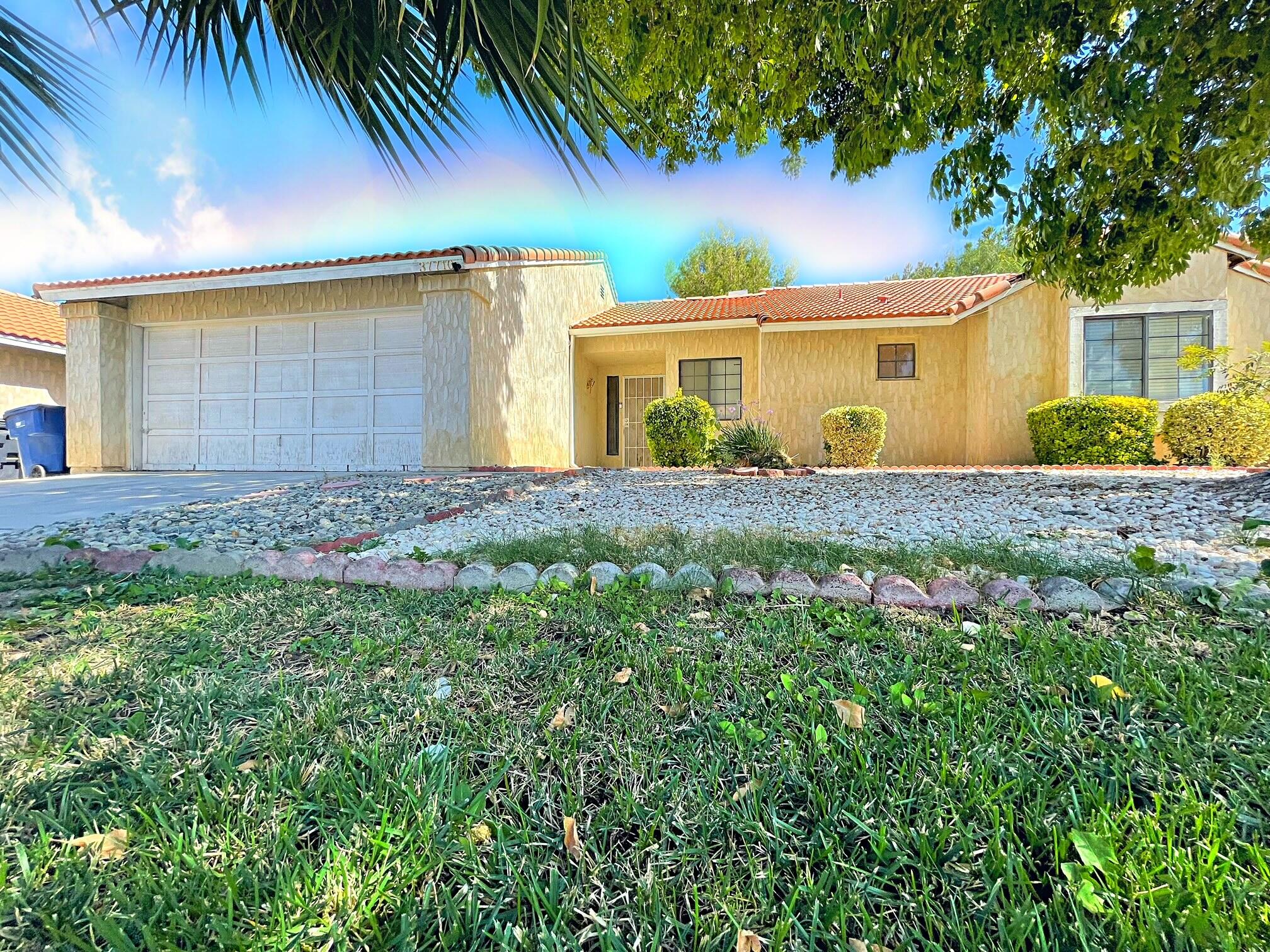 37710 Boxthorn Street Palmdale, CA 93552 - Photo 1 of 43 front view of a house with a big yard