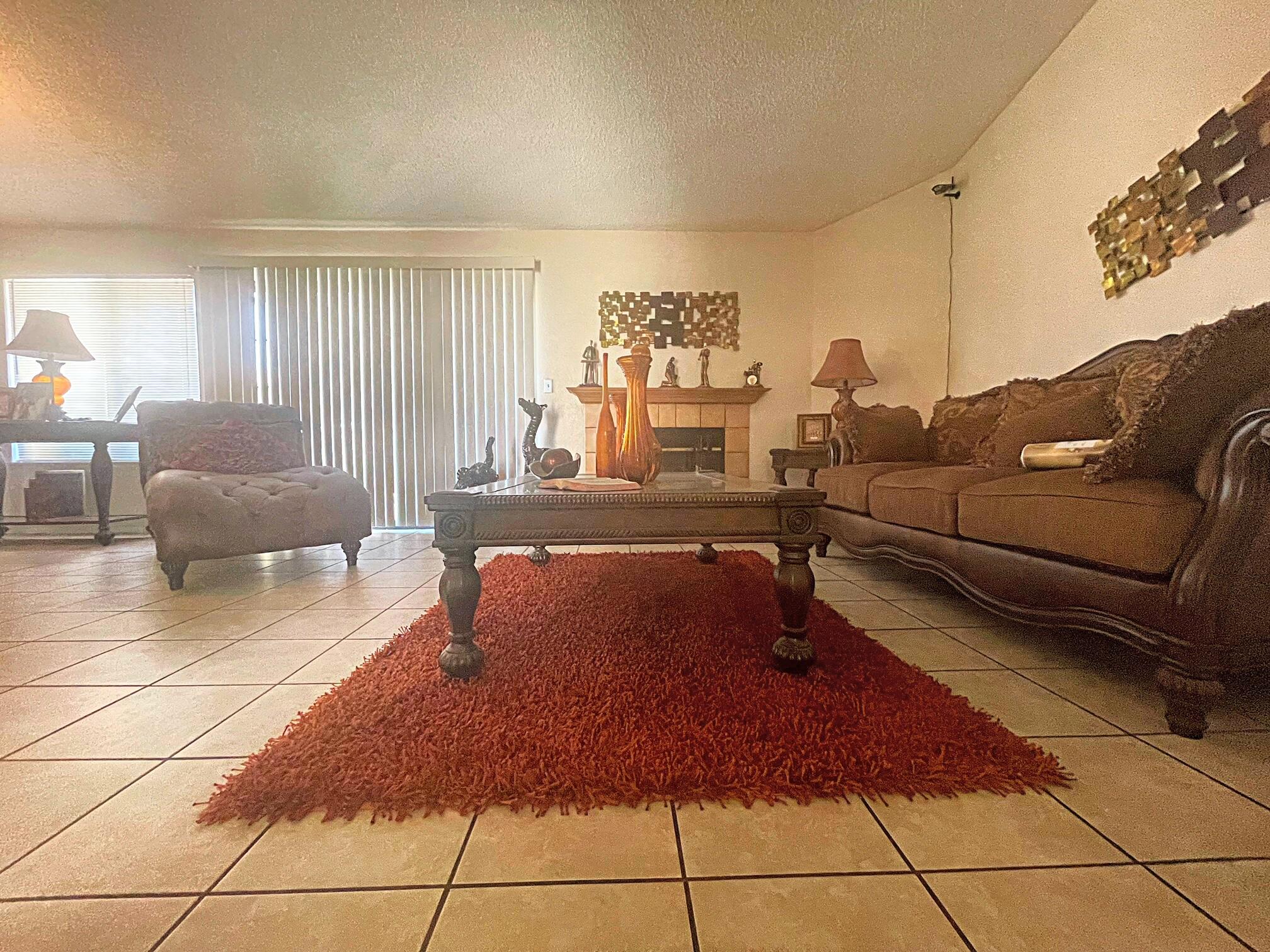 37710 Boxthorn Street Palmdale, CA 93552 - Photo 11 of 43 a living room with furniture