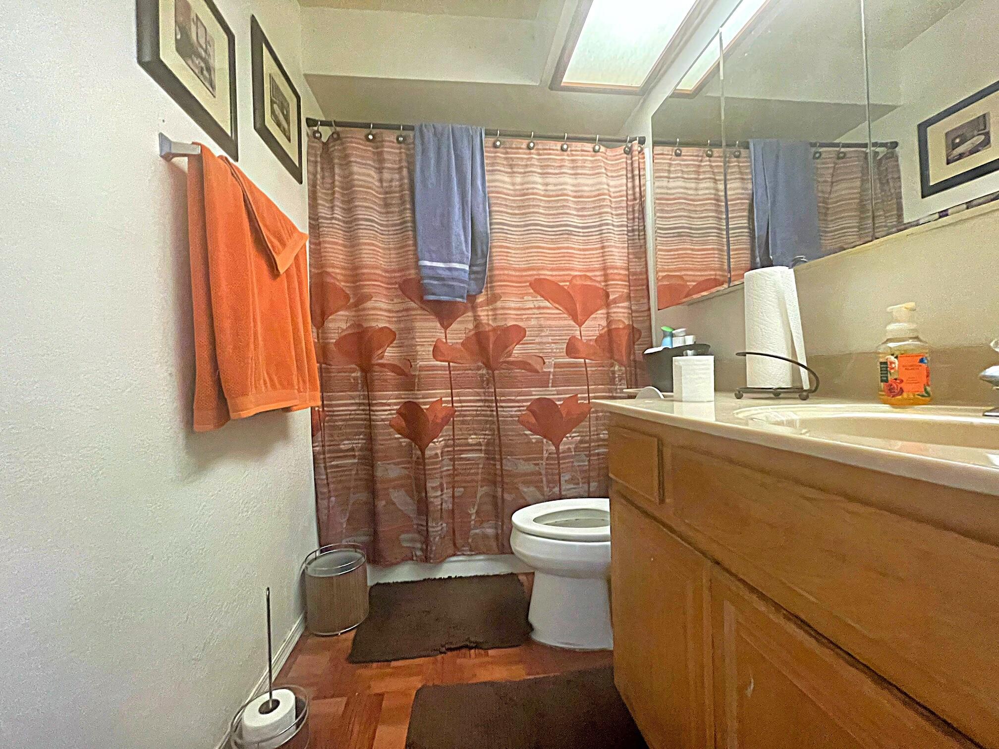 37710 Boxthorn Street Palmdale, CA 93552 - Photo 22 of 43 a bathroom with a sink toilet and shower