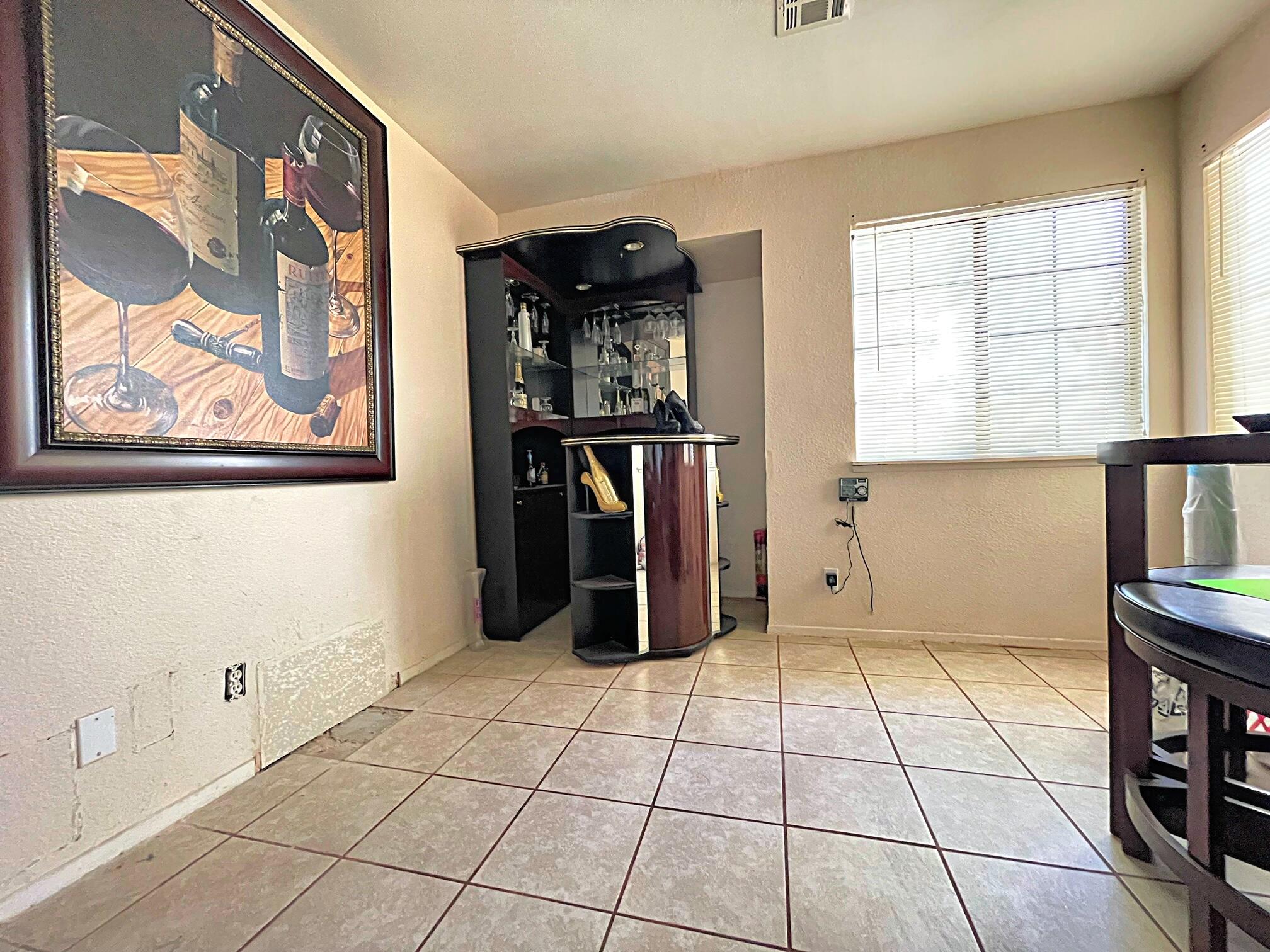 37710 Boxthorn Street Palmdale, CA 93552 - Photo 26 of 43 a view of an empty room with closet and a window