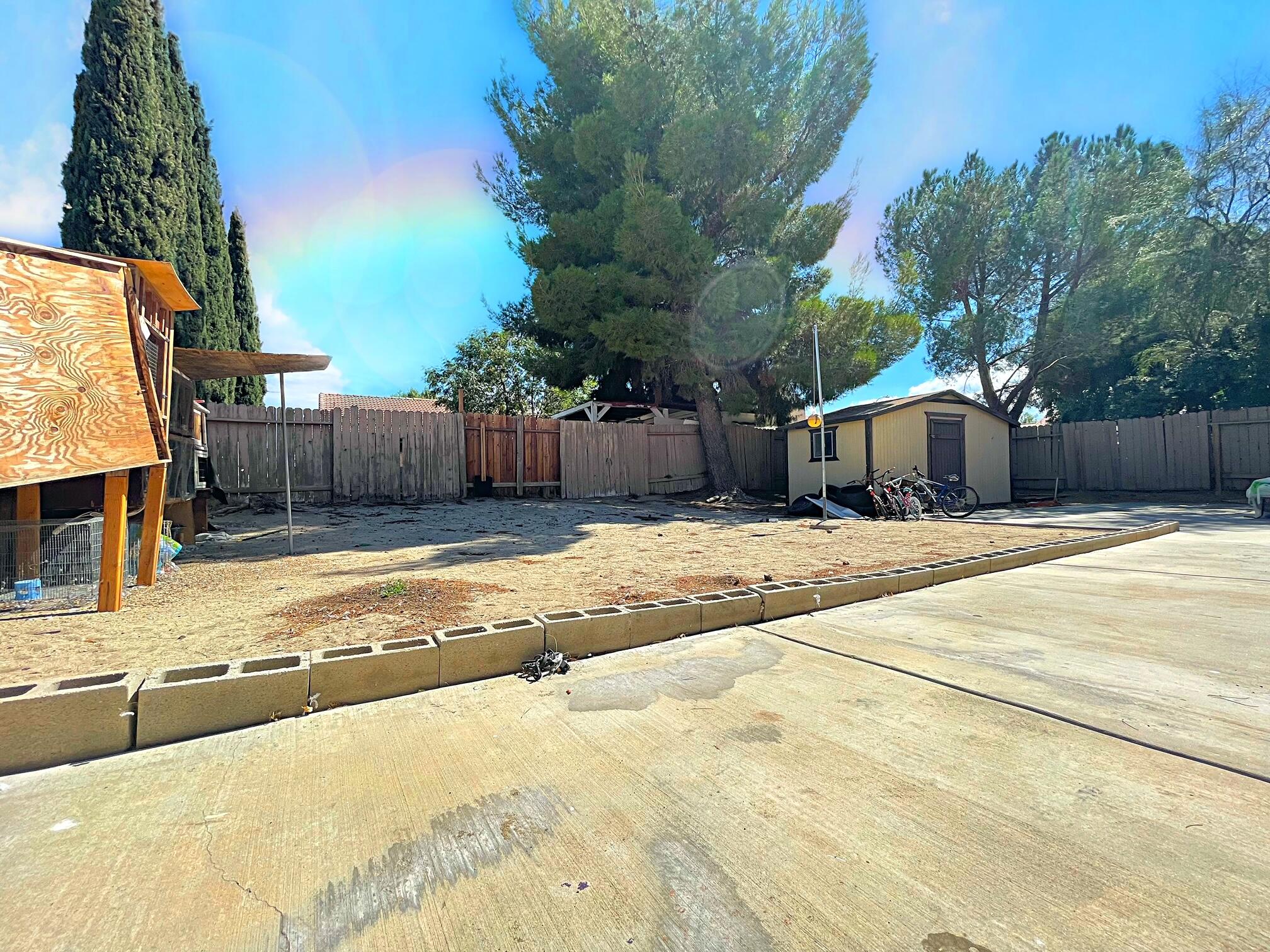 37710 Boxthorn Street Palmdale, CA 93552 - Photo 40 of 43 a view of a backyard