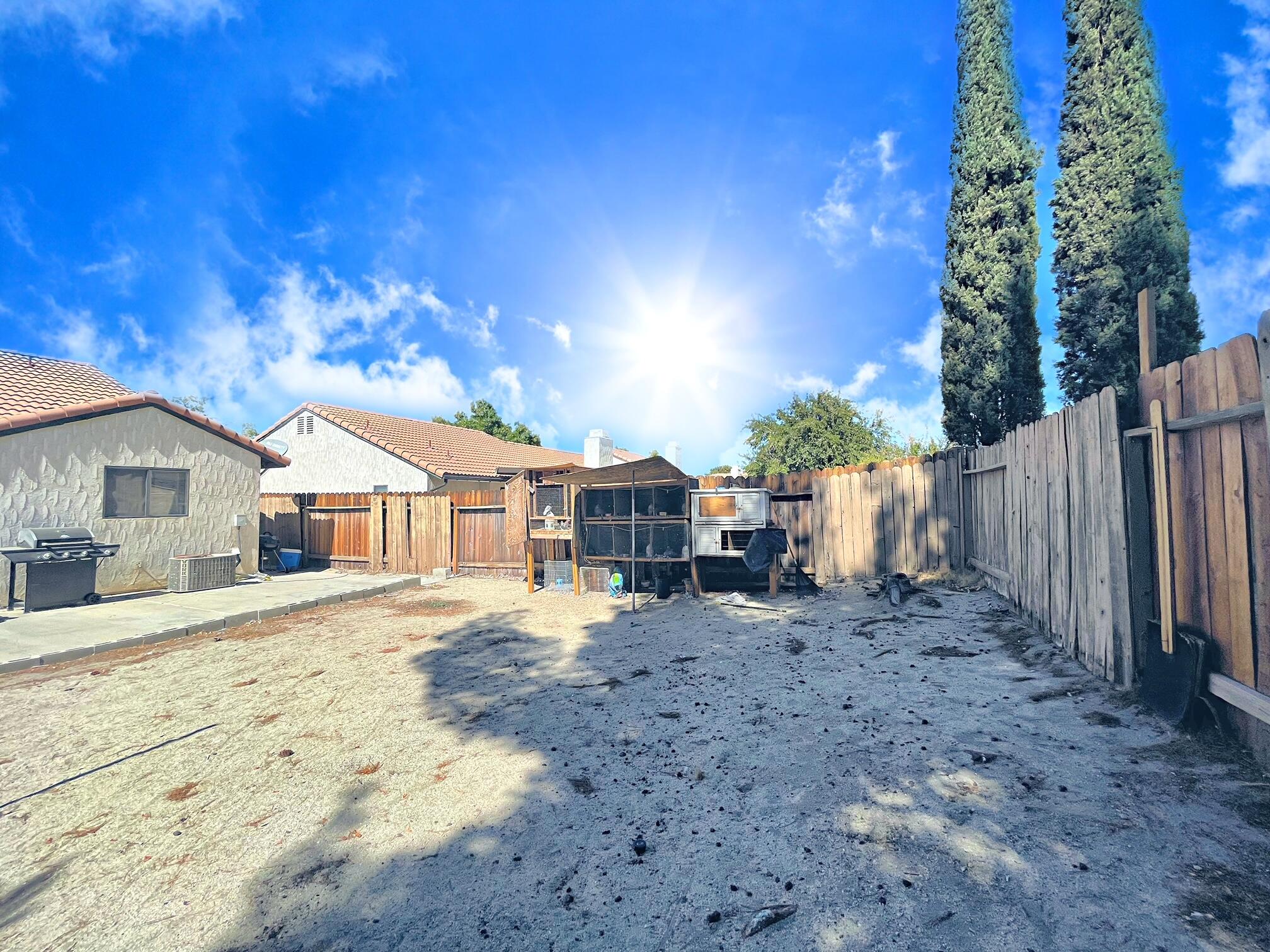 37710 Boxthorn Street Palmdale, CA 93552 - Photo 42 of 43 a view of a house with a yard
