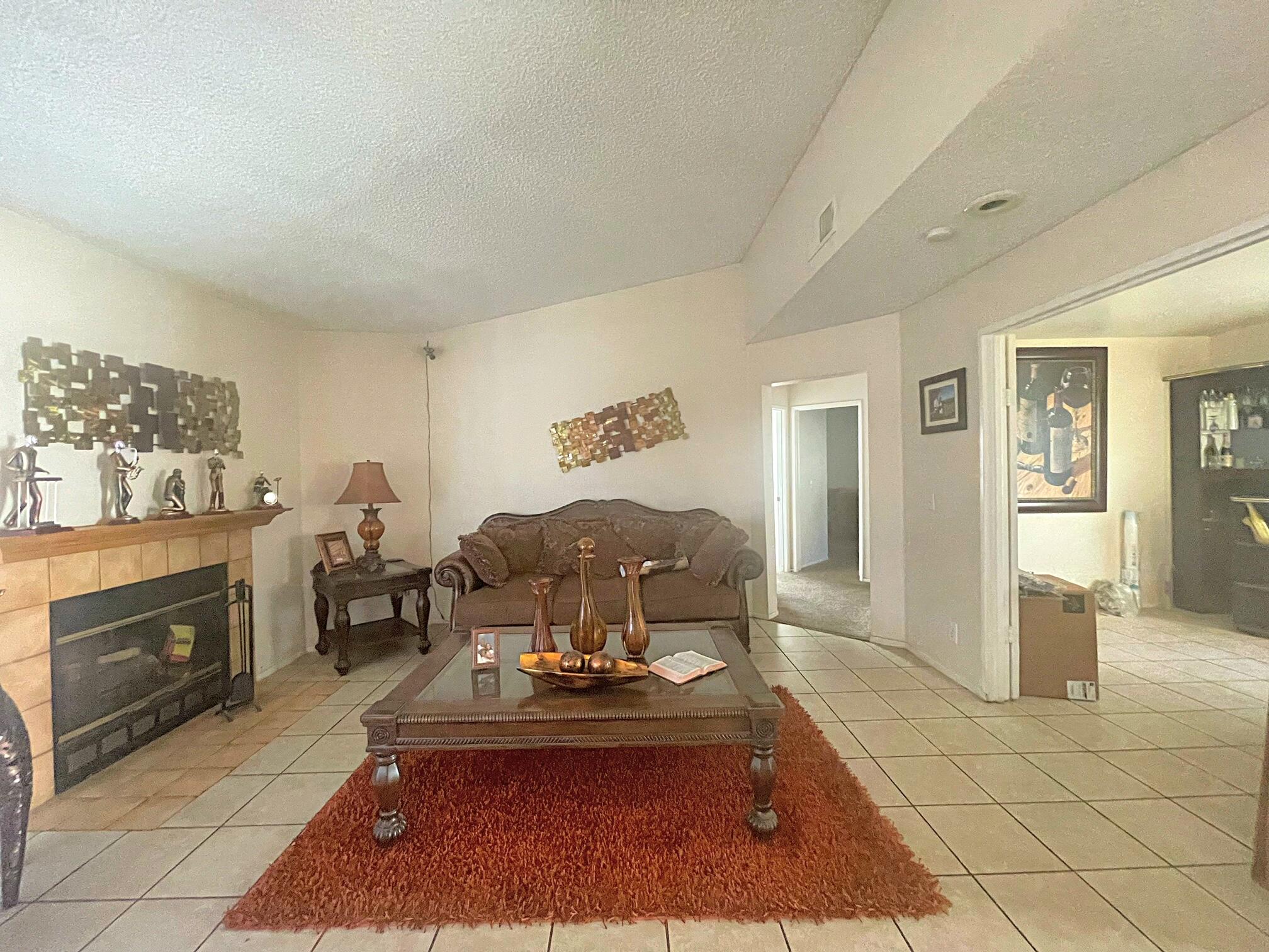 37710 Boxthorn Street Palmdale, CA 93552 - Photo 10 of 43 a living room with furniture